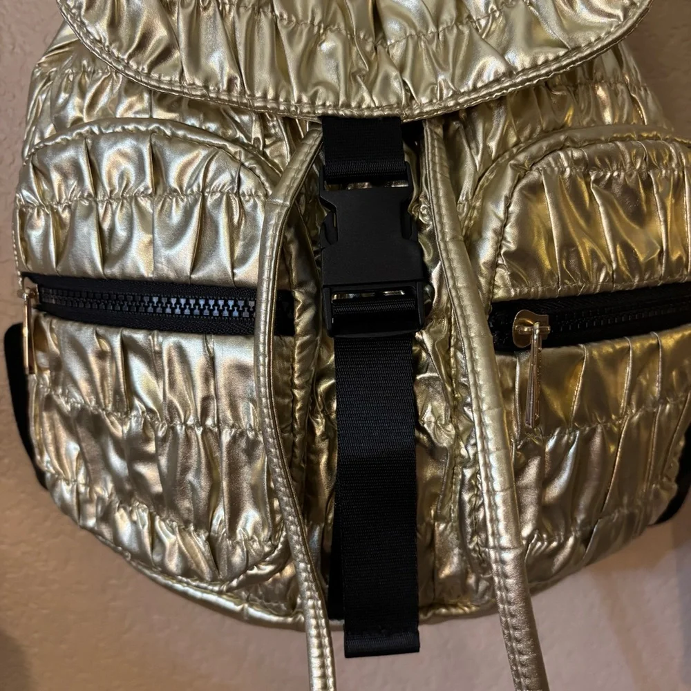 NWT Madden Girl Backpack Metallic Gold Quilted Drawstring Shiny Black Zip Straps